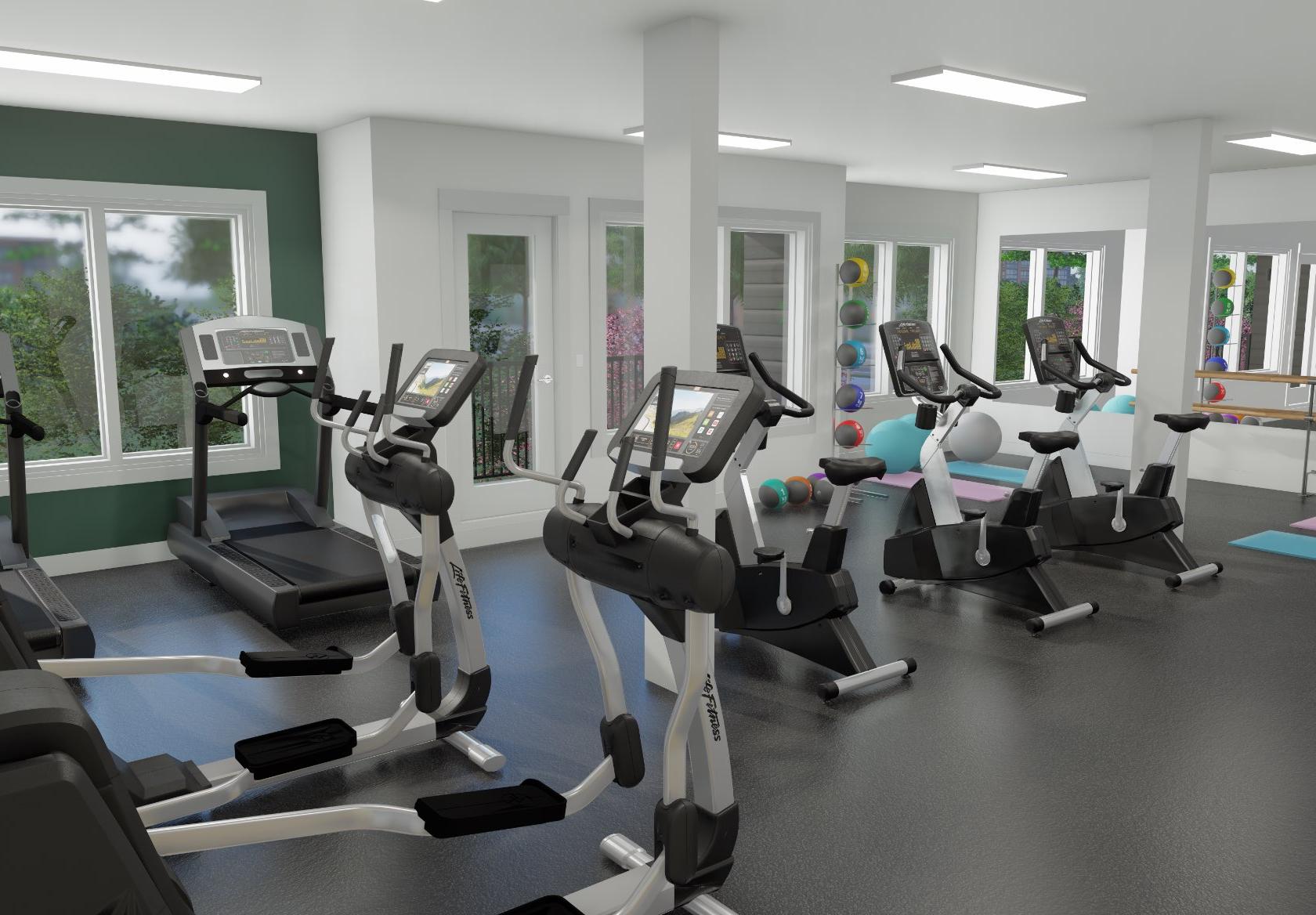 Onsite fitness room with cardio machines, weight training equipment and a yoga studio.