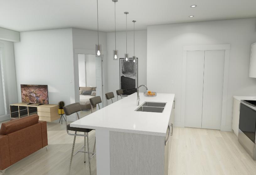 Open-concept kitchen with quarts countertops and stainless steel appliances.